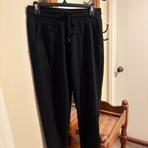 women's stars above black jogger pj pants small